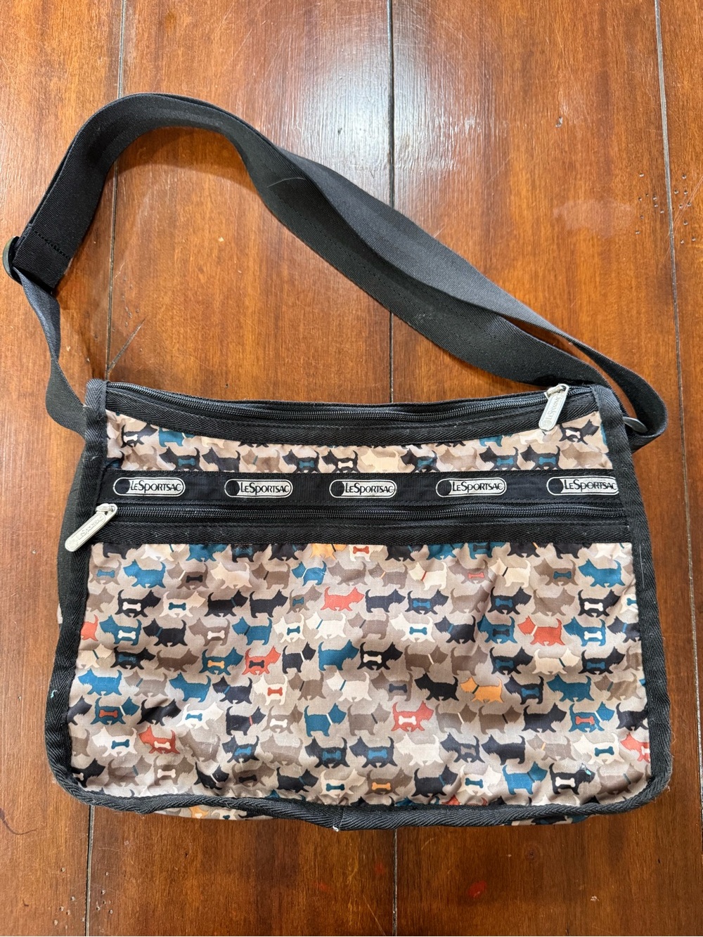 LeSportsac Multi-Dog Print Crossbody in Beige, Blue, Black & Red Accents